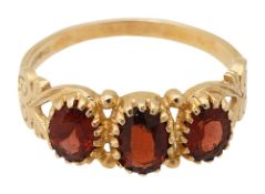 A three stone garnet ring