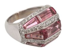 A stylish pink topaz and diamond-set ring