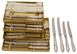 Twelve Elizabeth II Reed and Leaf pattern filled silver handled table and dessert knives