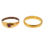 A 18ct garnet ring and a 22ct gold wedding band