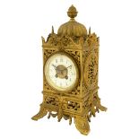 A late 19th century French lacquered brass mantel clock c.1900