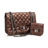 A Chanel bronze quilted 2.55 handbag and purse