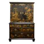 A George I black japanned and chinoiserie cabinet on chest