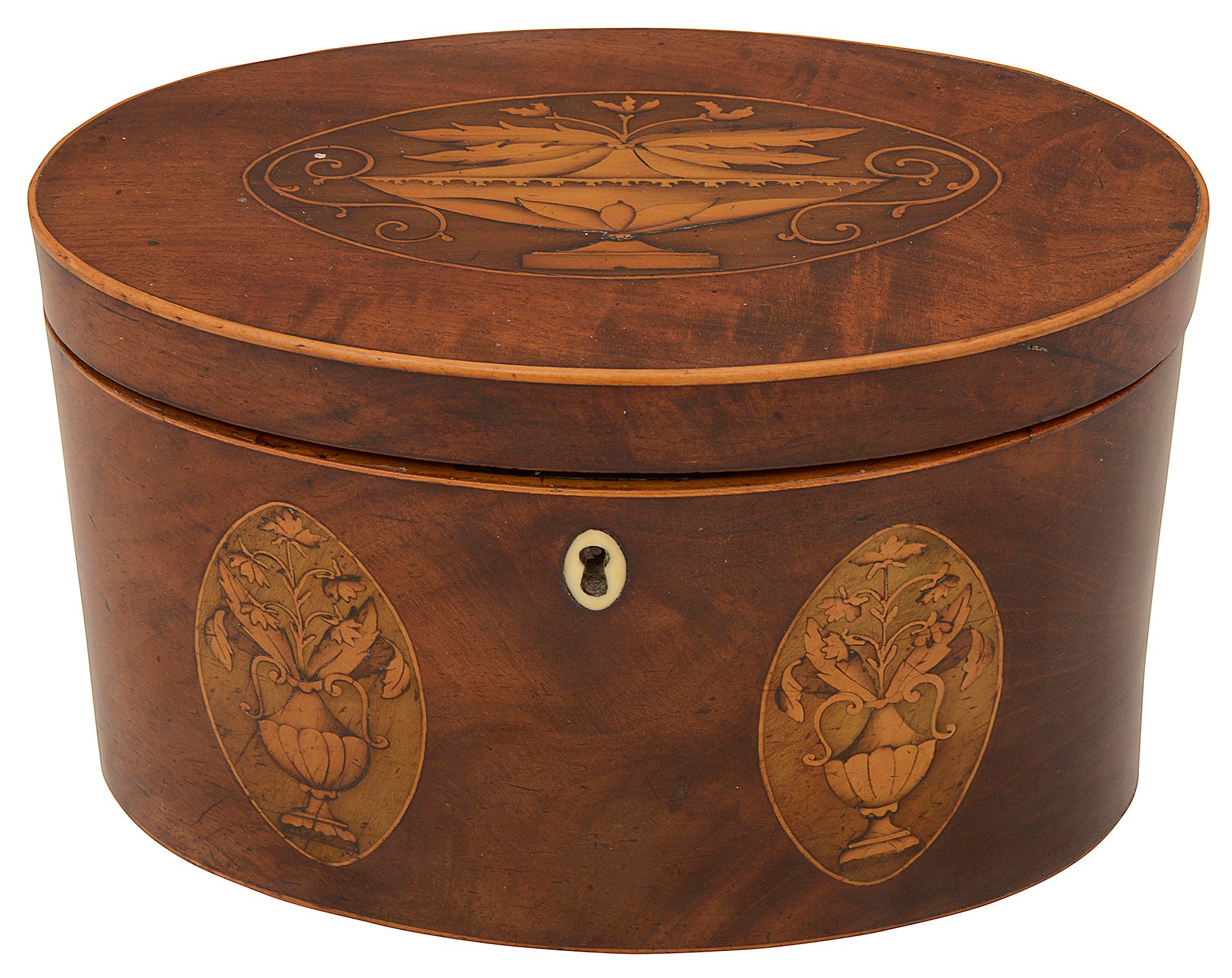 A George III mahogany and marquetry inlaid oval tea caddy