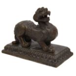 A Chinese Archaistic patinated bronze bixie scroll weight