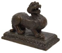 A Chinese Archaistic patinated bronze bixie scroll weight