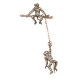 An early 20th century colourless paste-set double monkey brooch