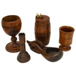 A treen turned oak candlestick, a beechwood string barrel and other items