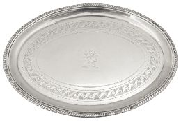 A George III silver oval teapot stand