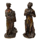 A pair of 19th century French bronze figures of a faun and a bacchante