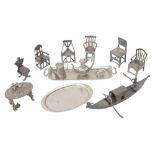 A collection of modern novelty silver miniature armchairs and other novelties