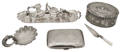 A Victorian caddy spoon, a miniature silver tea service, an oval silver box, other items