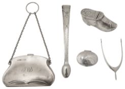 A late 19th century continental novelty silver vinaigrette in the form of a clog and other silver