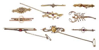 A collection of bar brooches