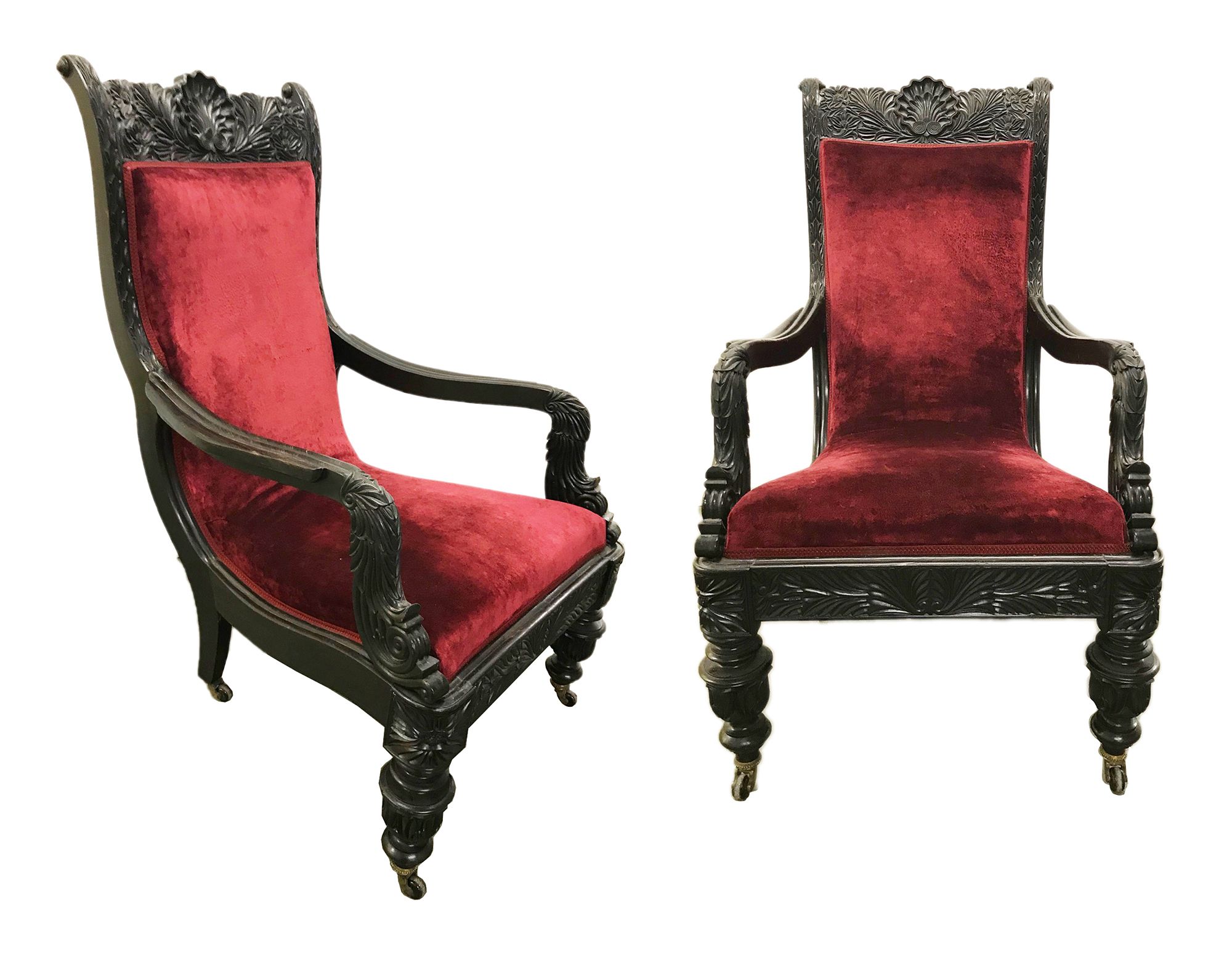 A pair of Anglo Indian ebony armchairs