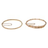 Two 15ct stiff hinged bangles