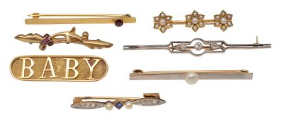 A collection of brooches