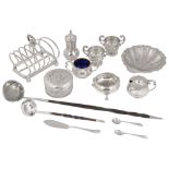 Edwardian and later silver to include a toast rack, three piece cruet set, butter dish and other ite