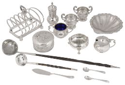 Edwardian and later silver to include a toast rack, three piece cruet set, butter dish and other ite