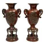 A pair of Meiji period Japanese bronze vases