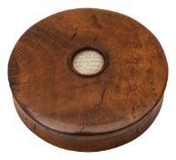 An early 19th century turned oak snuff box