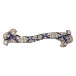 A diamond and sapphire-set brooch