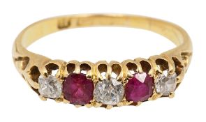 An Edwardian diamond and ruby five stone ring