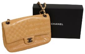 A Chanel biege calfskin flap bag