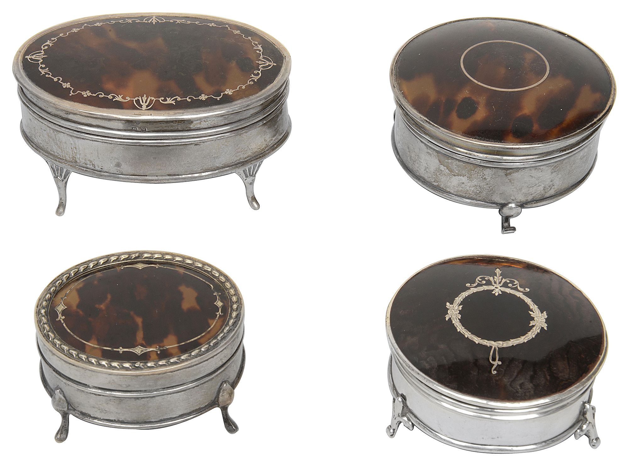 An oval tortoiseshell & silver trinket boxes & three others