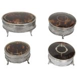An oval tortoiseshell & silver trinket boxes & three others