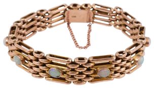 An Edwardian 9ct gold four bar gatelink bracelet