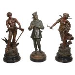 A group of three spelter figures, circa 1900.