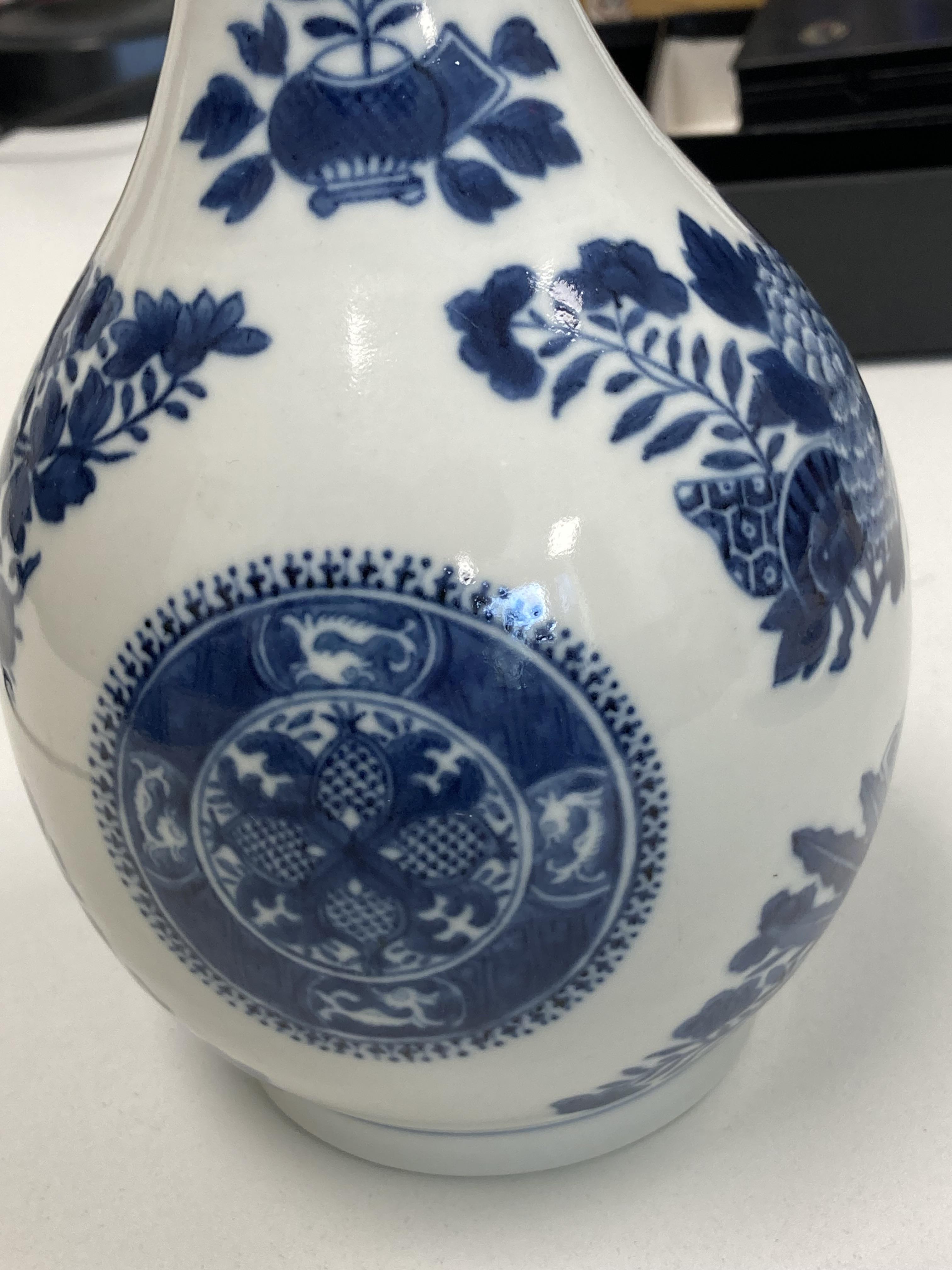 A Chinese blue and white bottle vase - Image 5 of 9