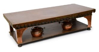 A large Arts and Crafts copper plate / food warmer