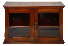 RMS Olympic Interest. A mahogany glazed wall cabinet c.1910