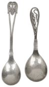 A silver jam spoon and a spoon