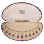 An Edwardian amethyst and seed pearl fringe necklace
