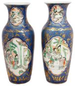 A pair of Chinese famille vert and powder blue vases