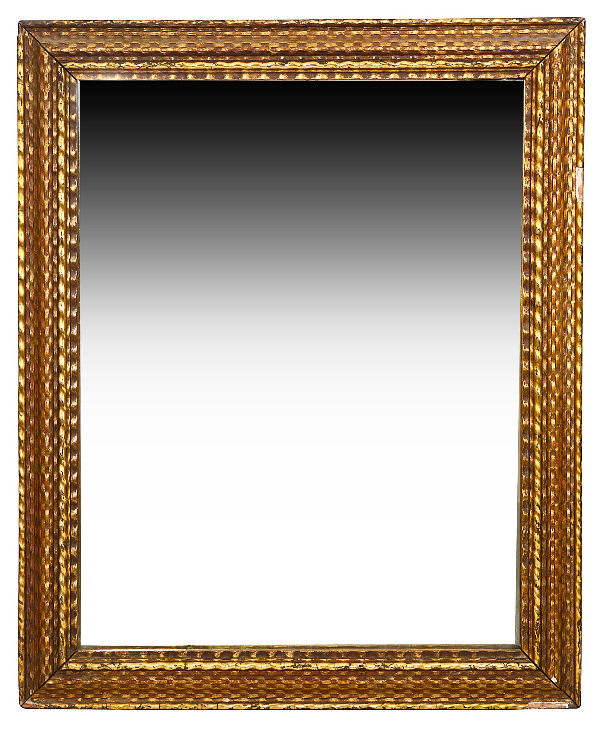 A late 19th century gilt gesso framed mirror