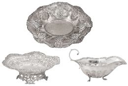 A late Victorian silver dish, an Edwardian dish and a gravy boat