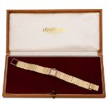 A 9ct lady's Longines cased bracelet watch