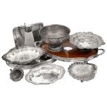 Two galleried trays and seven items of silver plate