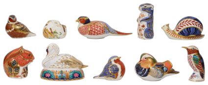 A collection of ten Royal Crown Derby paperweights