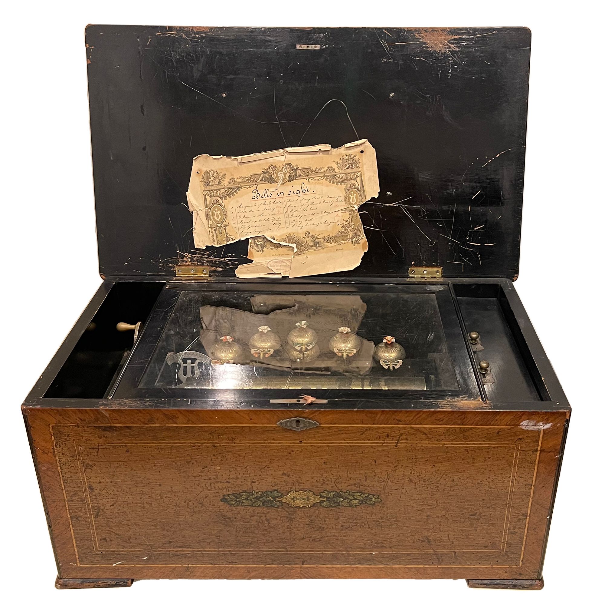 A later 19th century bells-in-sight cylinder musical box