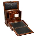 A late Victorian oak tabletop writing cabinet