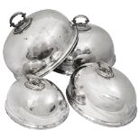 Four Edwardian graduated silver plated meat domes