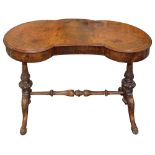 A Victorian walnut kidney shaped dressing table