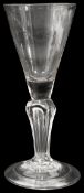 An early 18th century moulded stem wine glass c.1720