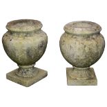 A near pair of French marble urns