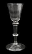 An early 18th century balustroid wine glass c.1730